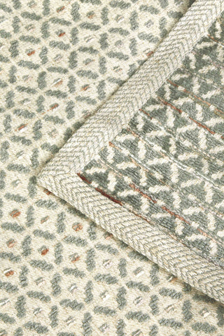 close up detail of green throw